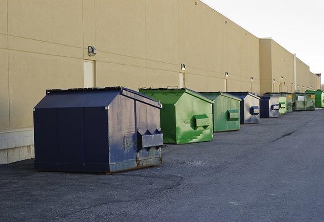 portable, green construction dumpsters serving as a container for scrap materials in Canyon Lake